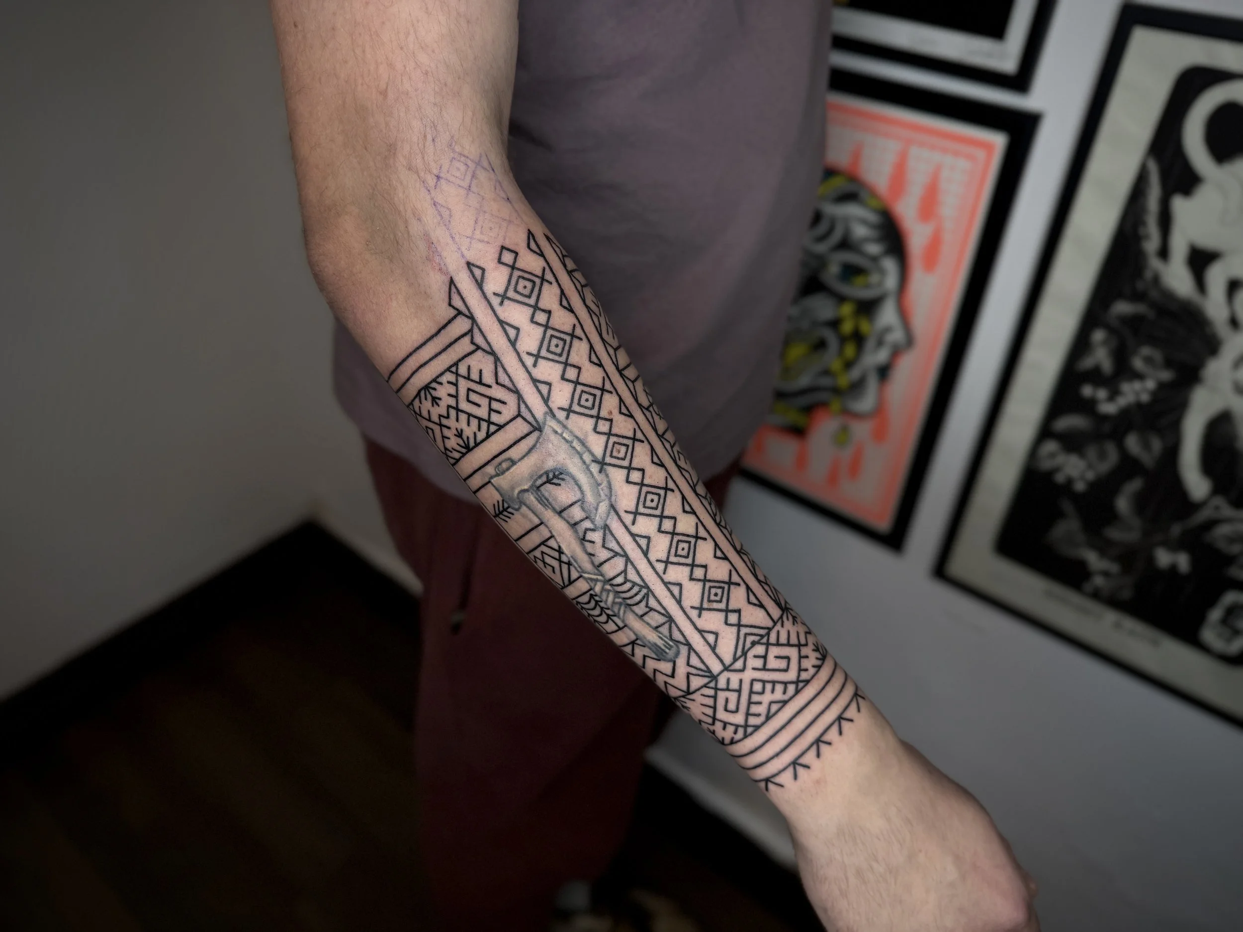 Justas Jurkevičius-Tattoo Artist-baltic style arm tattoo
