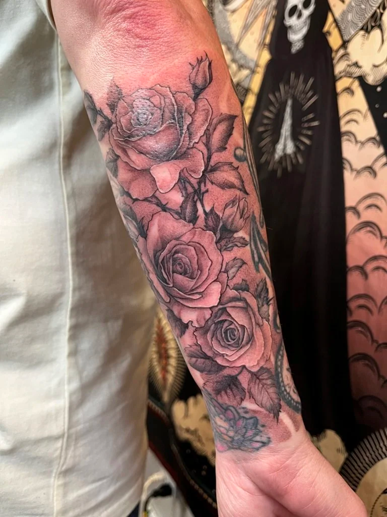 Bryant Howerton - Tattoo Artist - flower tattoo on arm