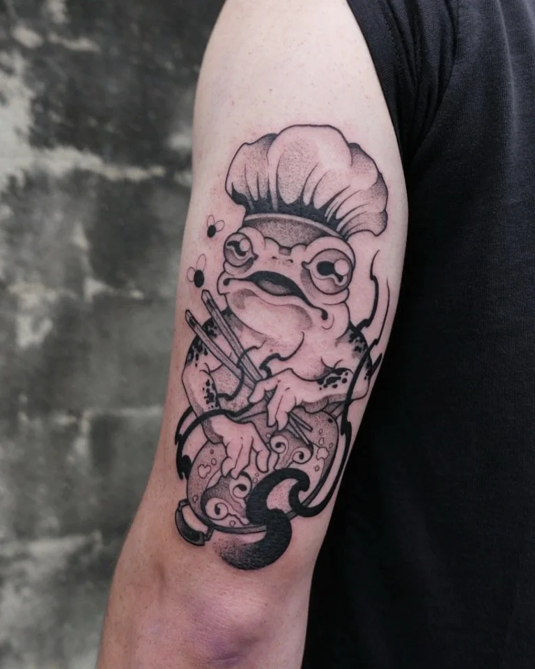 Tattoo Artist - AnEcho - black and gray tattoo of frog with chef's hat
