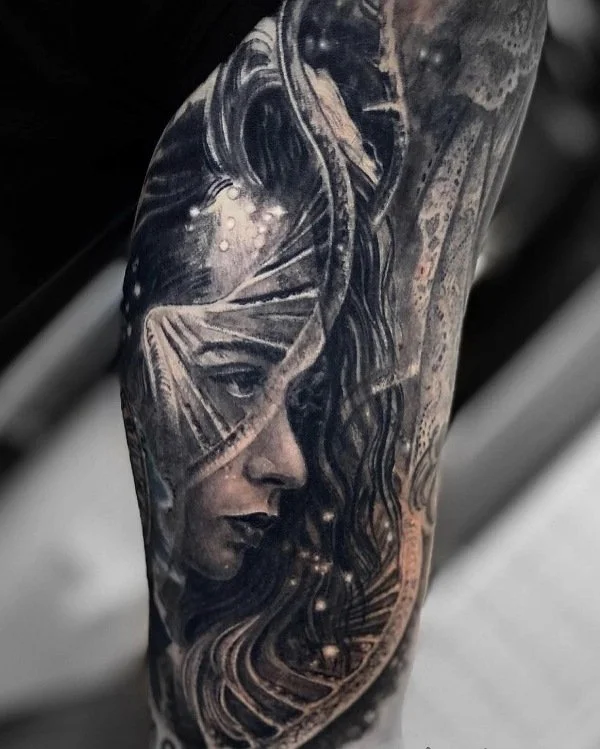 black and gray tattoo by Vic Tamian