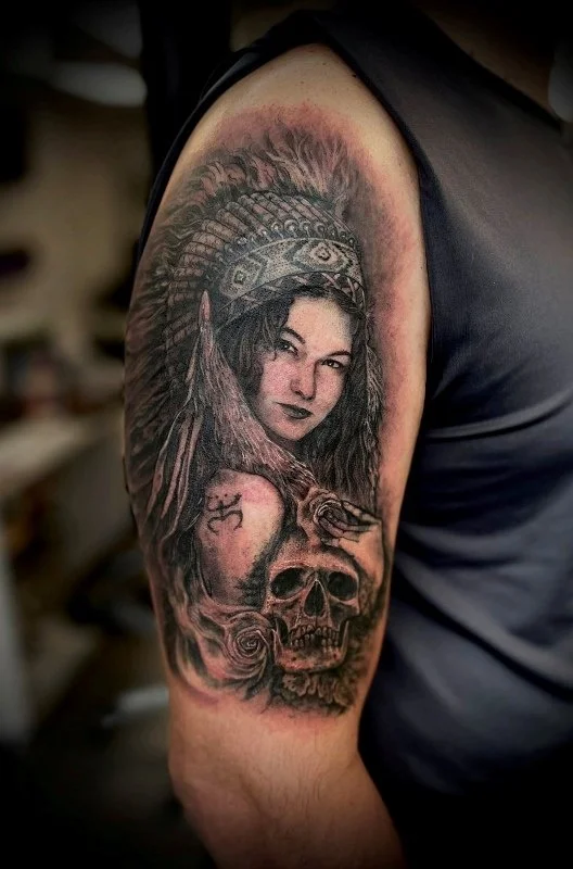 black and gray tattoo by Vic Tamian