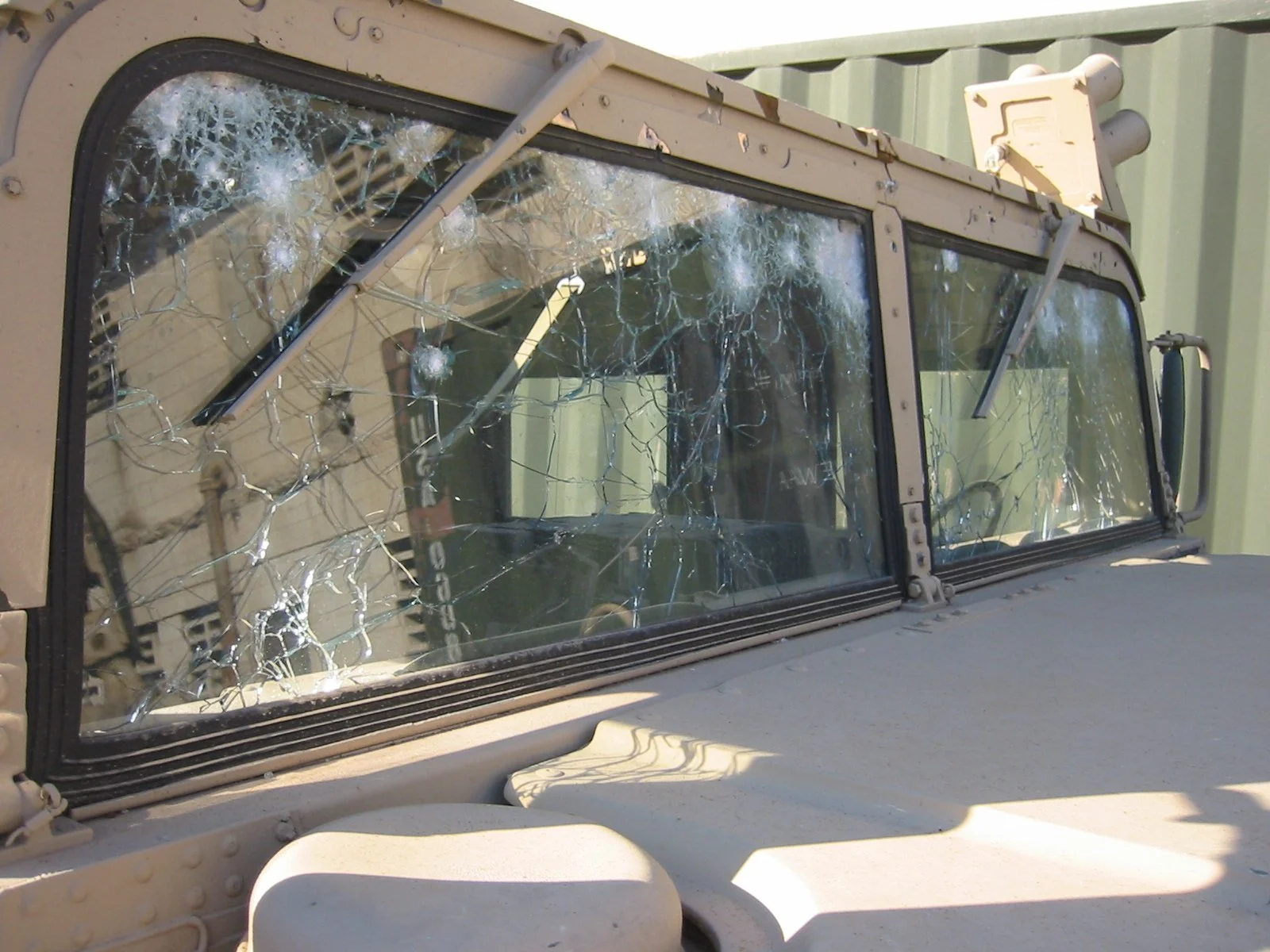 Humvee with bullet hits in windshield at abu Gharib