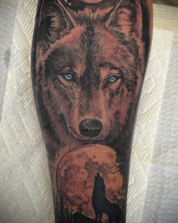 wolf tattoo by Vic Tamian
