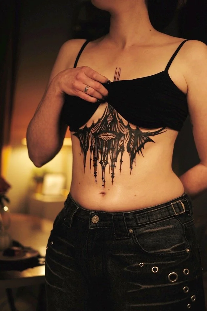 black and gray tattoo on torso  by Misha Bardak artist