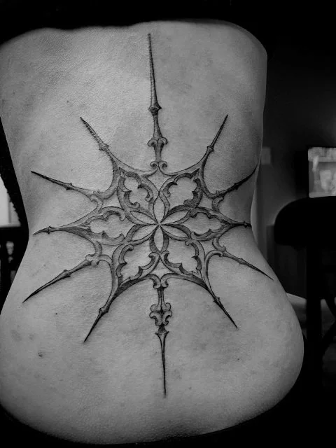 bone_merchant tattoo artist - back tattoo ornamental black