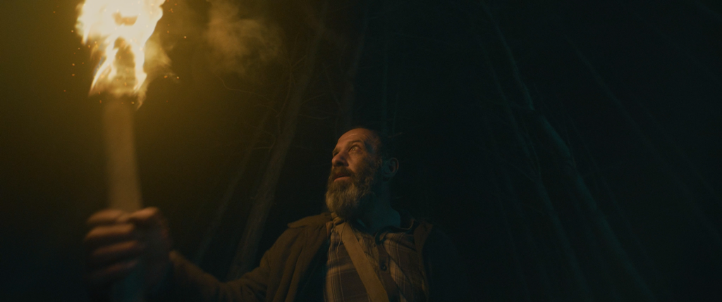 Obitus production still from film
