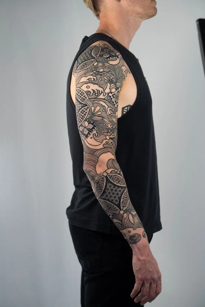 tattoo artist Kevin Ligabue - black and gray Japanese inspired sleeve