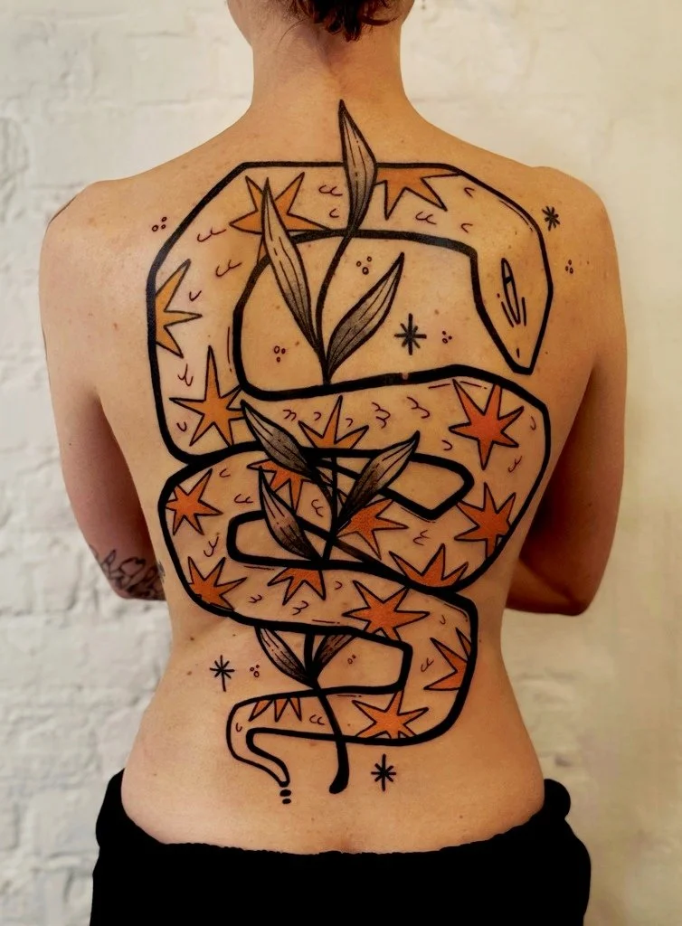 Laura_Arroz_tattoo_artist-snake with stars back tattoo