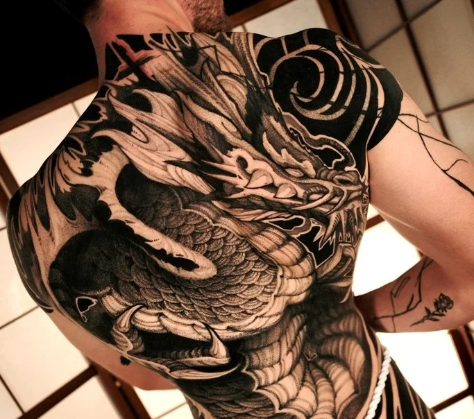 black and gray back tattoo by Misha Bardak artist