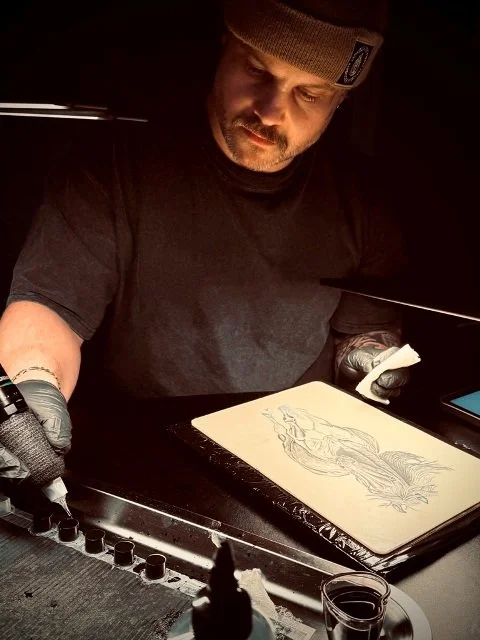 bone_merchant tattoo artist