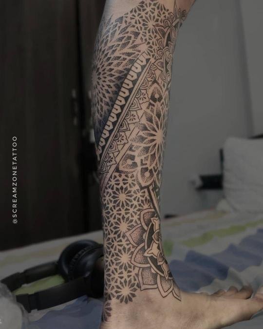 mandala tattoo on calf