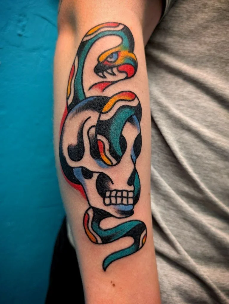 snake in a skull tattoo - Traditional Tattoo Berlin - Tattoos by Mariano