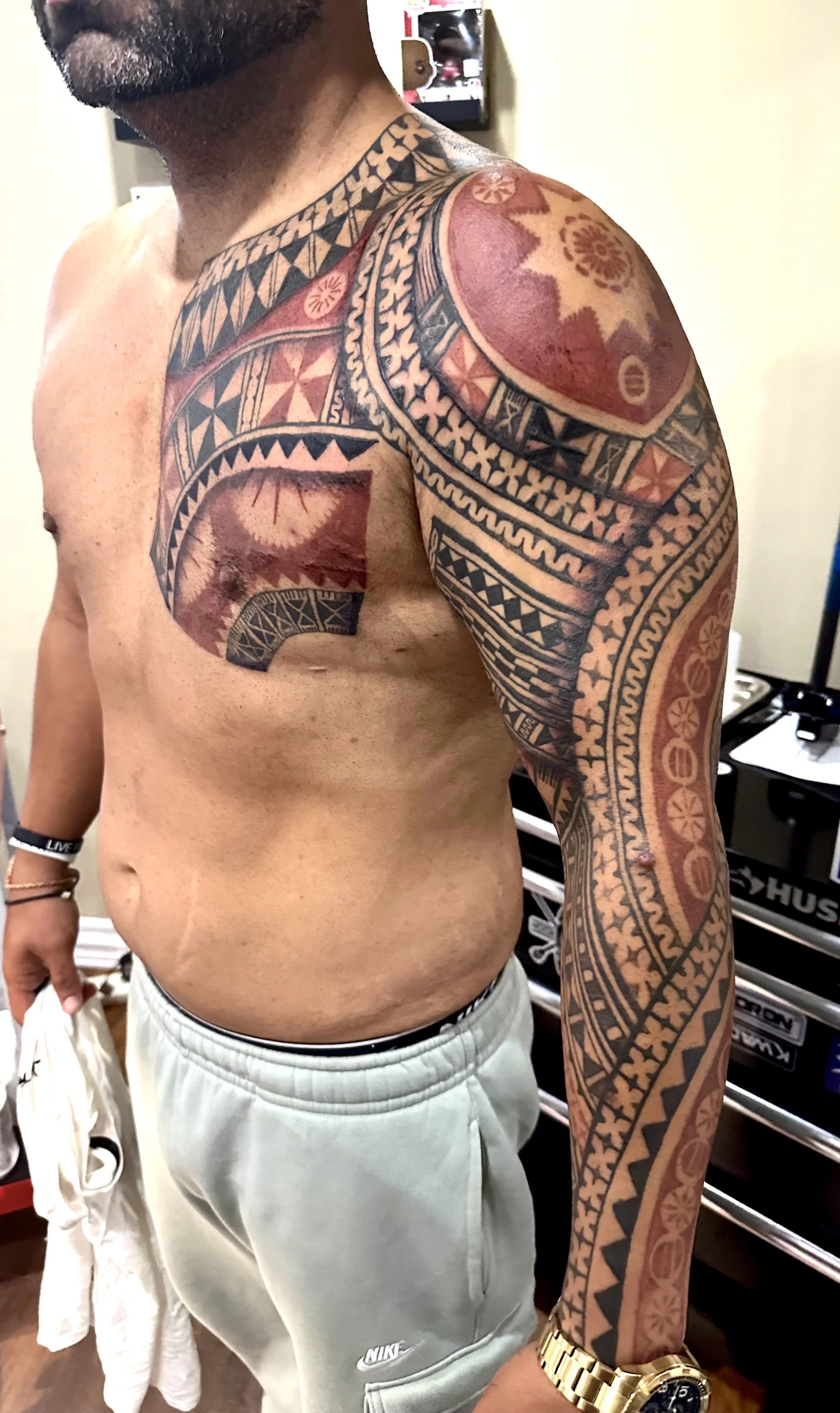 Eugene Perez - tattoo artist - sleeve and chest work- tribal