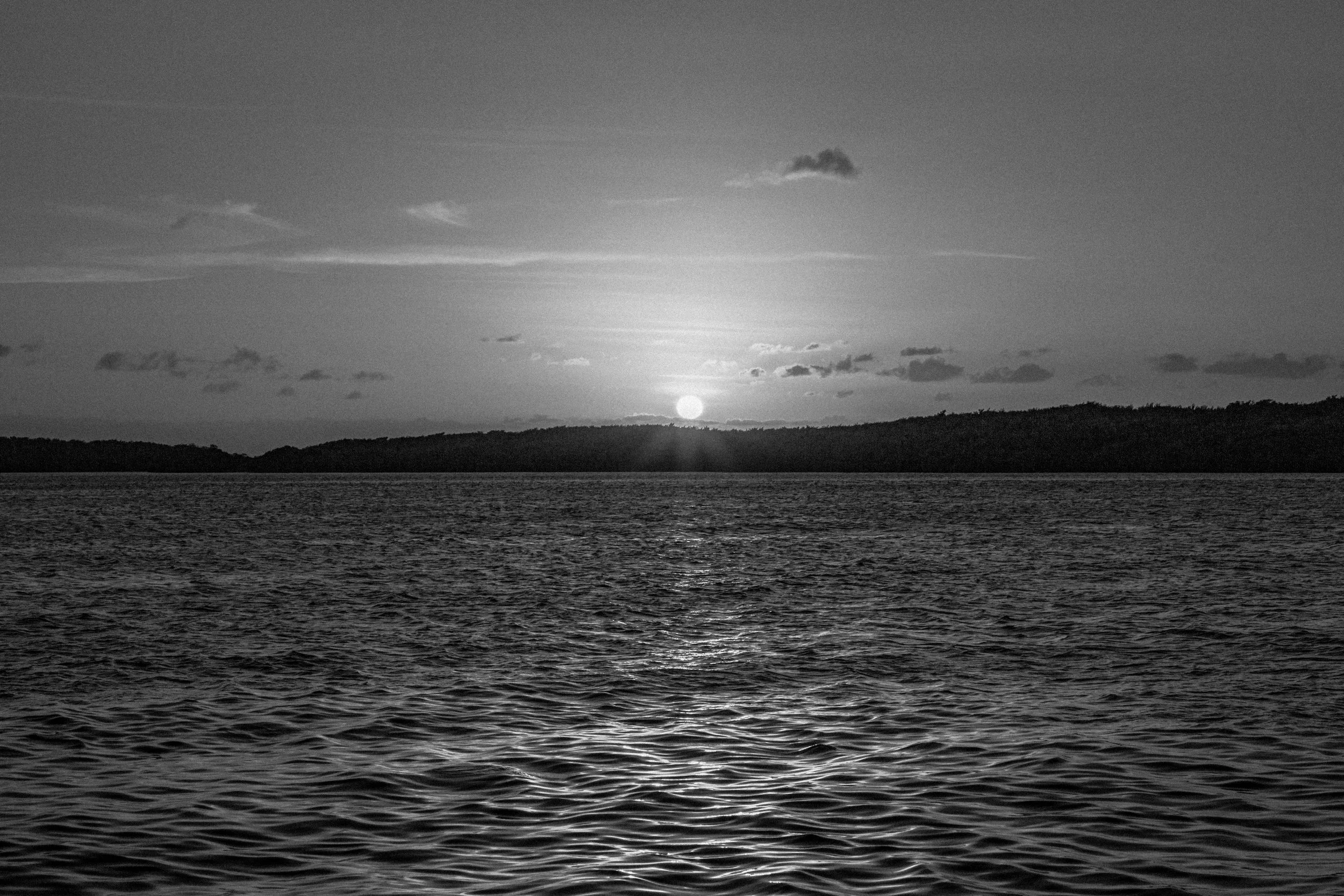 Photo of sunrise over the water