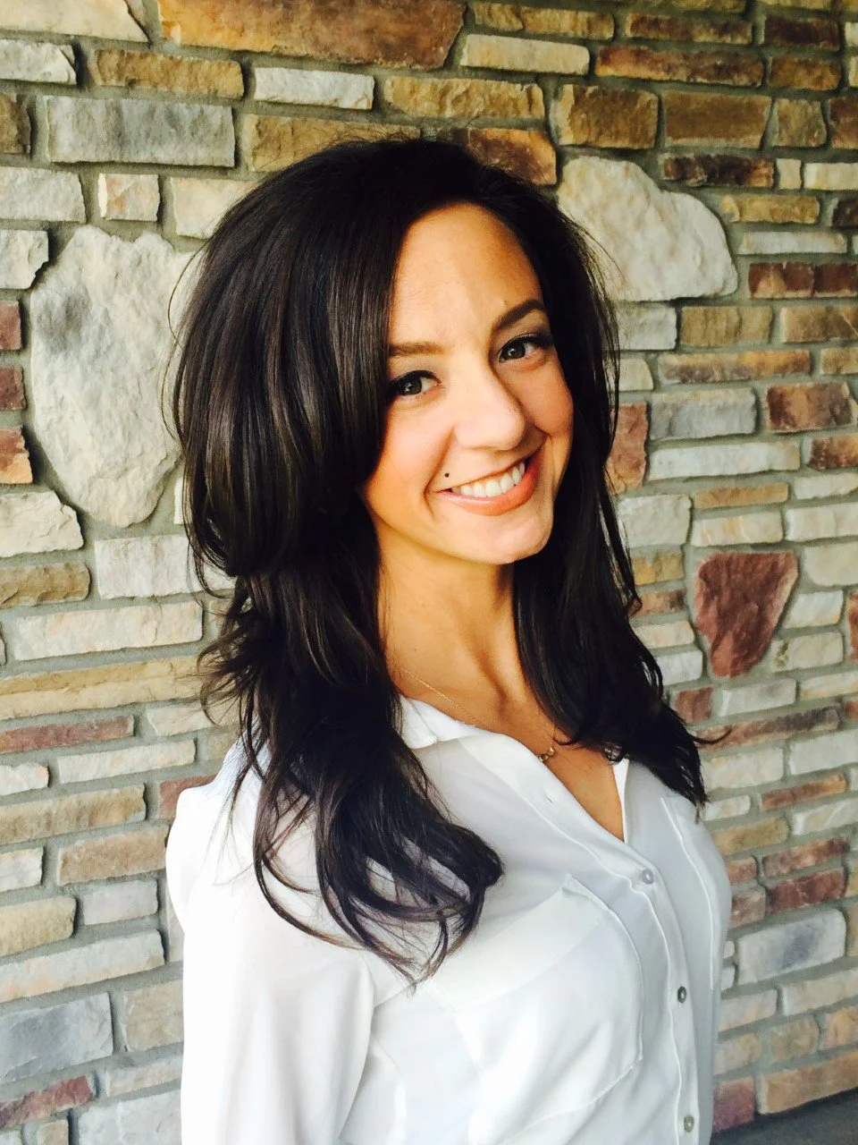 professional skincare specialist wearting white shirt