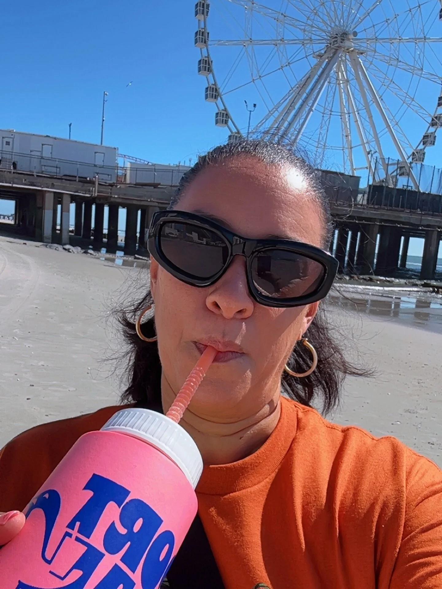 Enjoying the beautiful weather at the beach with a frozen drink in hand because it&rsquo;s five o&rsquo;clock somewhere. 🌴☀️

#BeachDay #BeachDay #authorlife #FiveOClockSomewhere #FrozenDrink #BeachLife #SunnyDays #RelaxAndUnwind