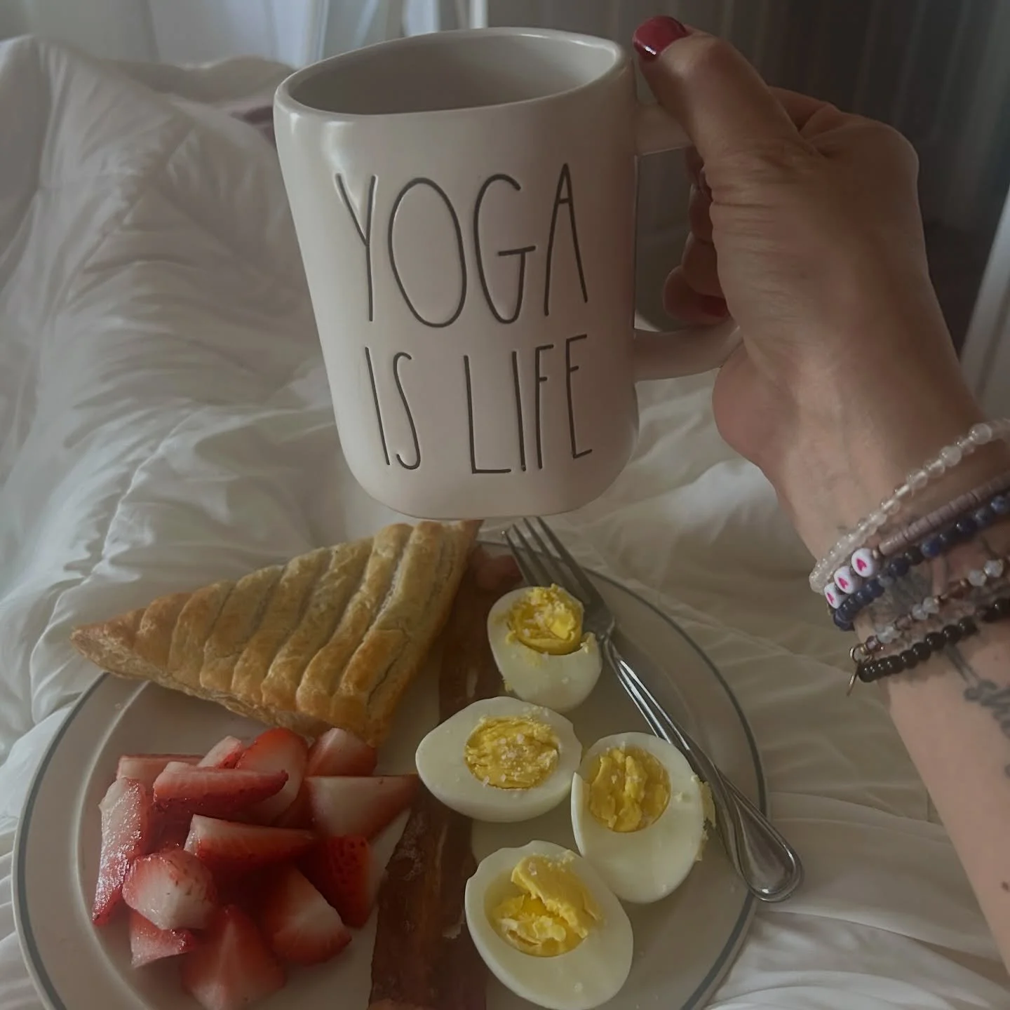 First sleep-in in a week, and my hubby delivered breakfast in bed. Hard boiled eggs, bacon, fruit, a croissant, and my yoga mug, because balance. 

Today&rsquo;s only plan? Teaching a workshop, connecting with some incredible authors, and soaking in 