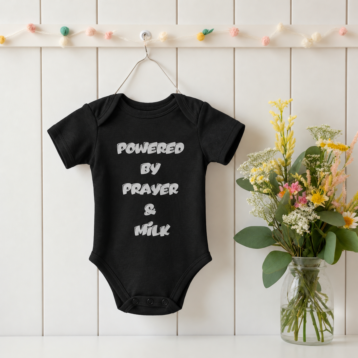 Onesie - Powered by Prayer & Milk - B&W Design v2.png