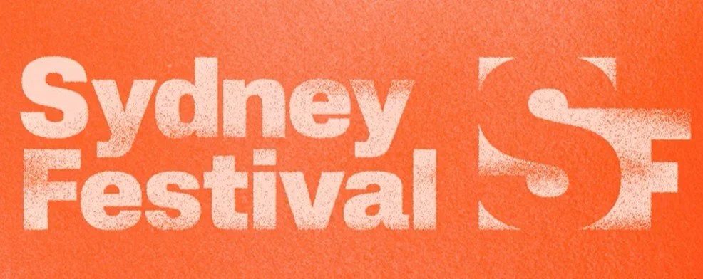 Text reading 'Sydney Festival' on an orange background with some distortion.
