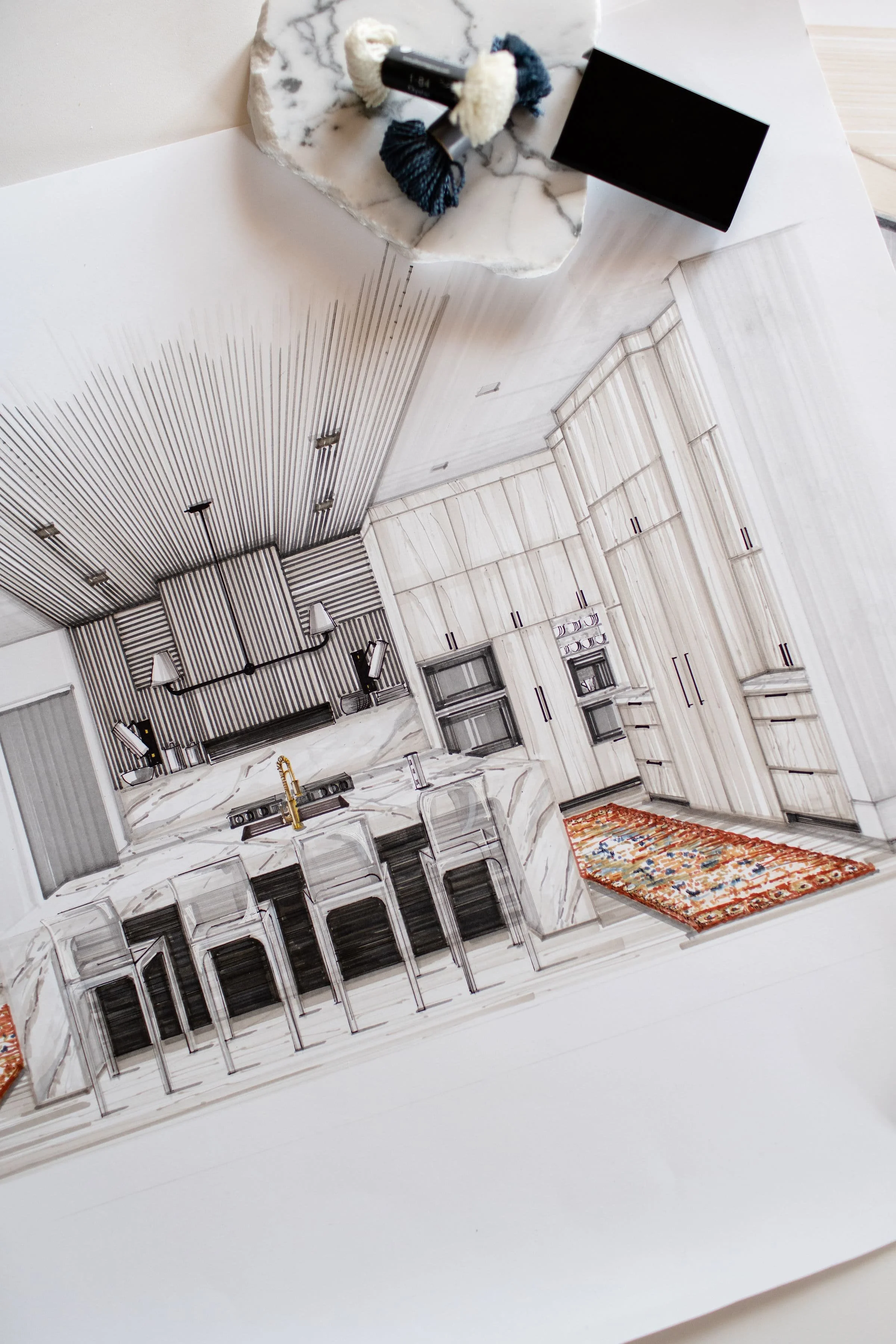 Rendered 3D design of a modern kitchen with white marble countertops, black accents, and a colorful area rug.