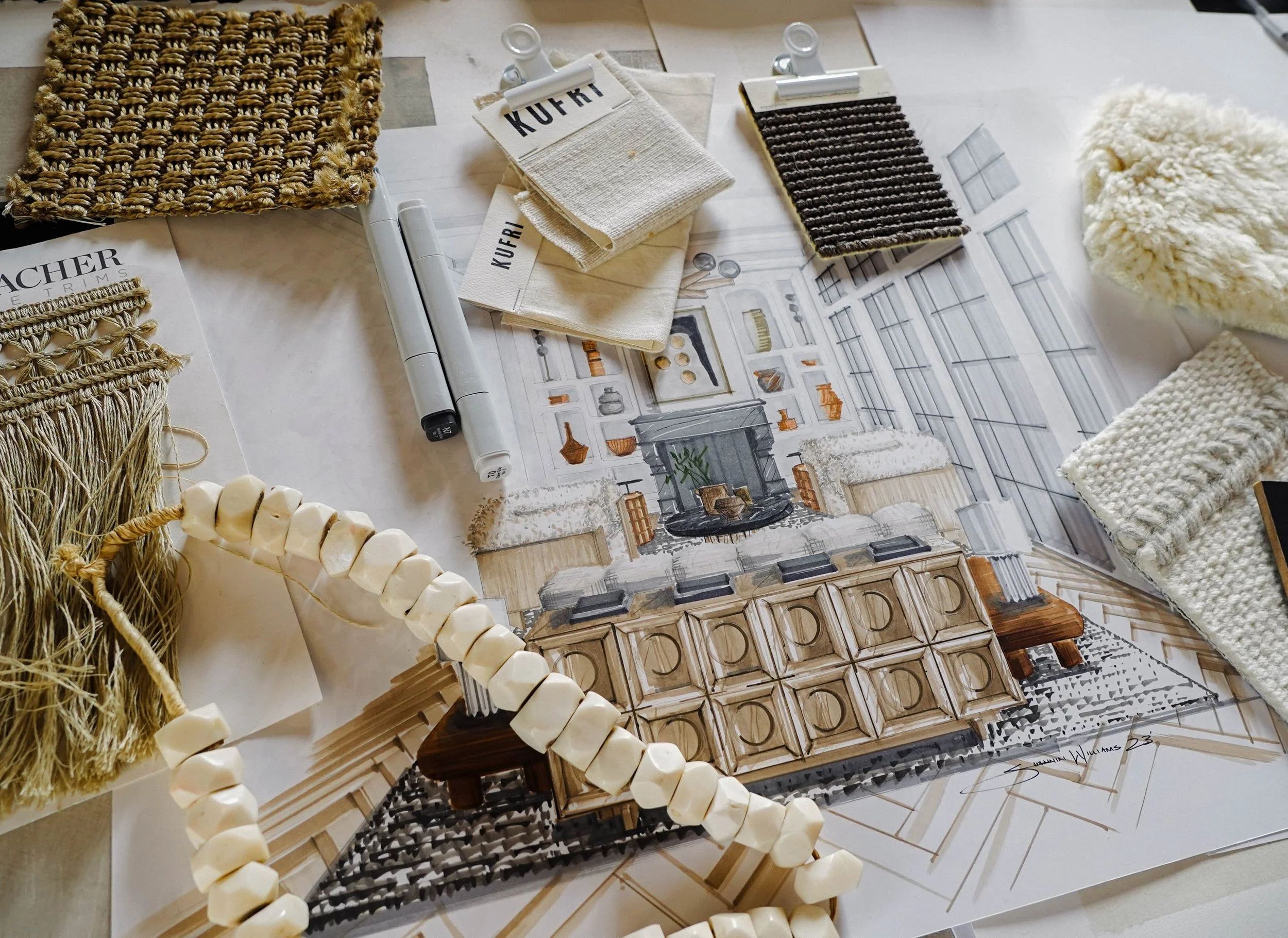 Interior design sketches, fabric samples, and decorative elements for a living room.