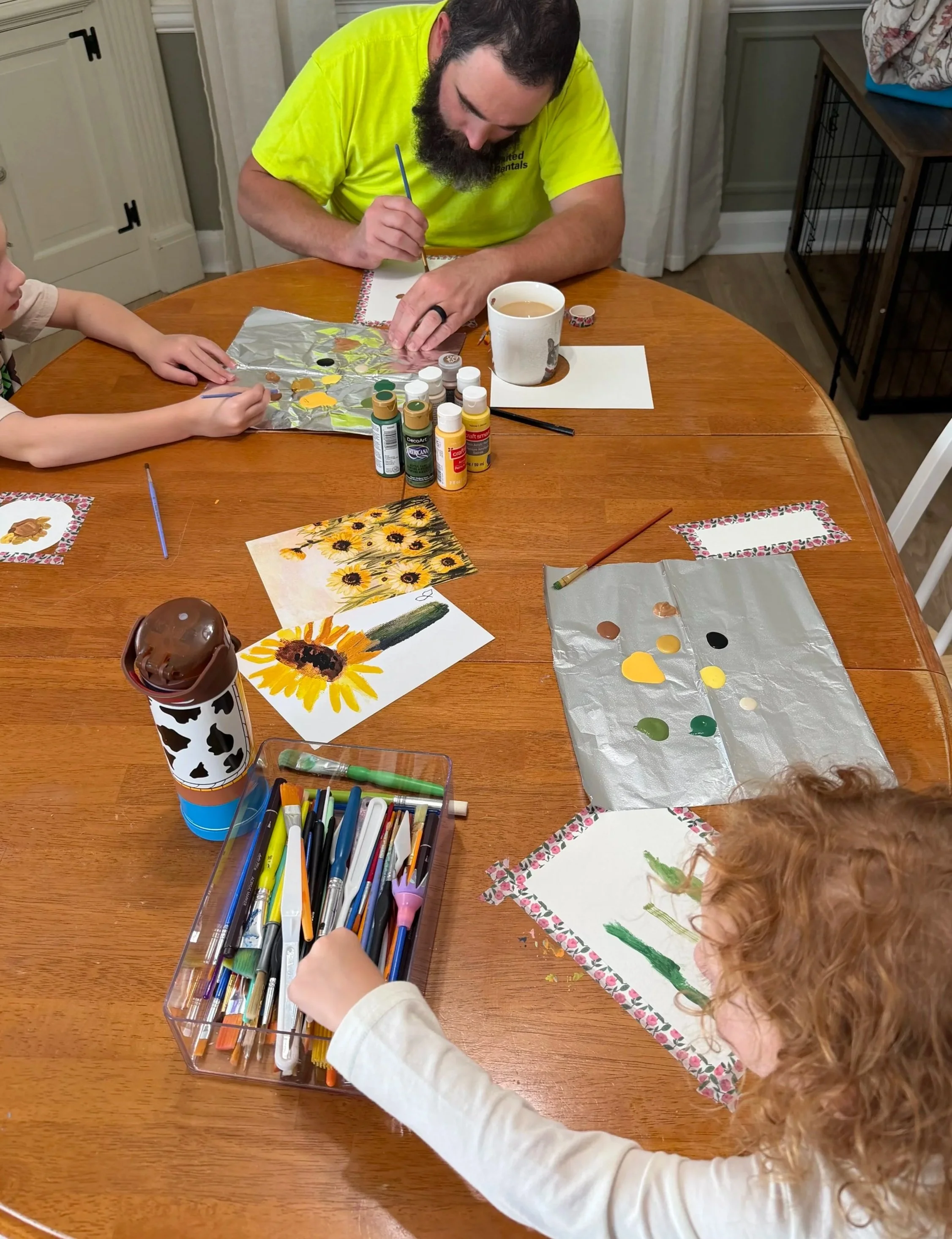 Dad, Declan (aged 6) and Caden (aged 3) painting together