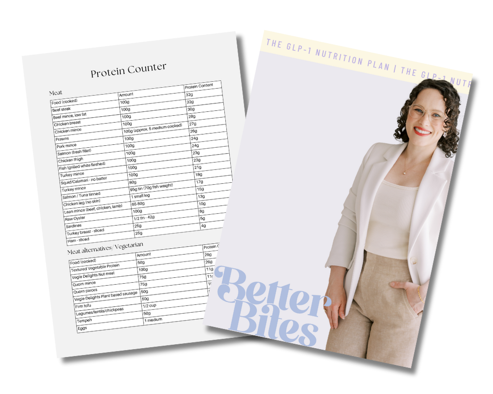 A woman with curly hair and glasses, dressed in a white blazer and beige pants, smiling on a brochure titled "Better Bites" with a star on her lapel. Next to it, a printed protein counter and a nutrition plan.