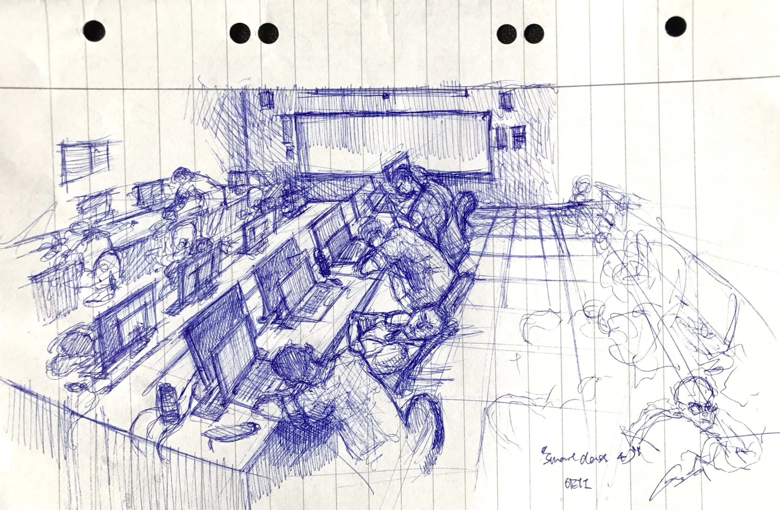 A detailed sketch of a control room with people working at multiple computer stations, some facing screens, and a man standing. The room has a large screen or whiteboard on the back wall and various equipment around. The drawing is made with blue ink