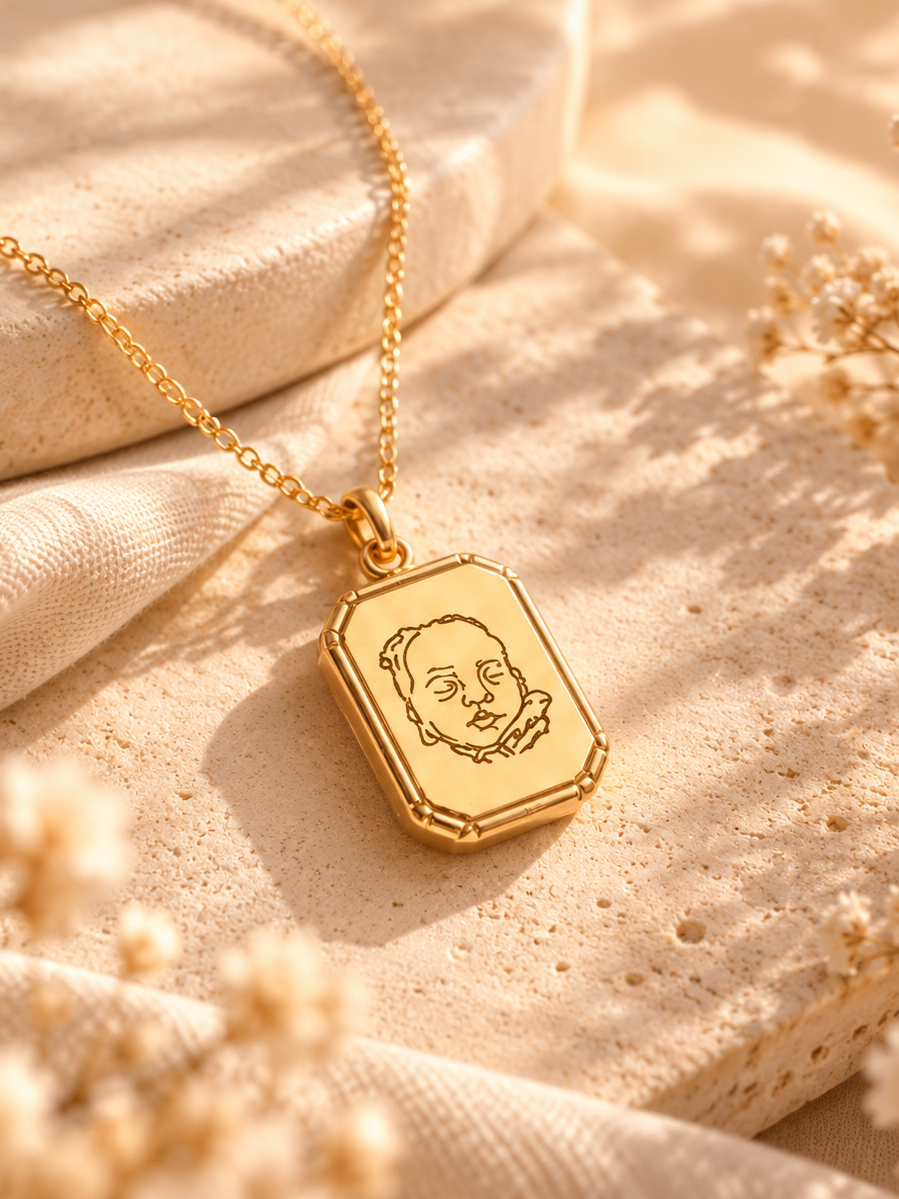 Personalised Lumeve portrait necklace engraved from a baby’s ultrasound image.