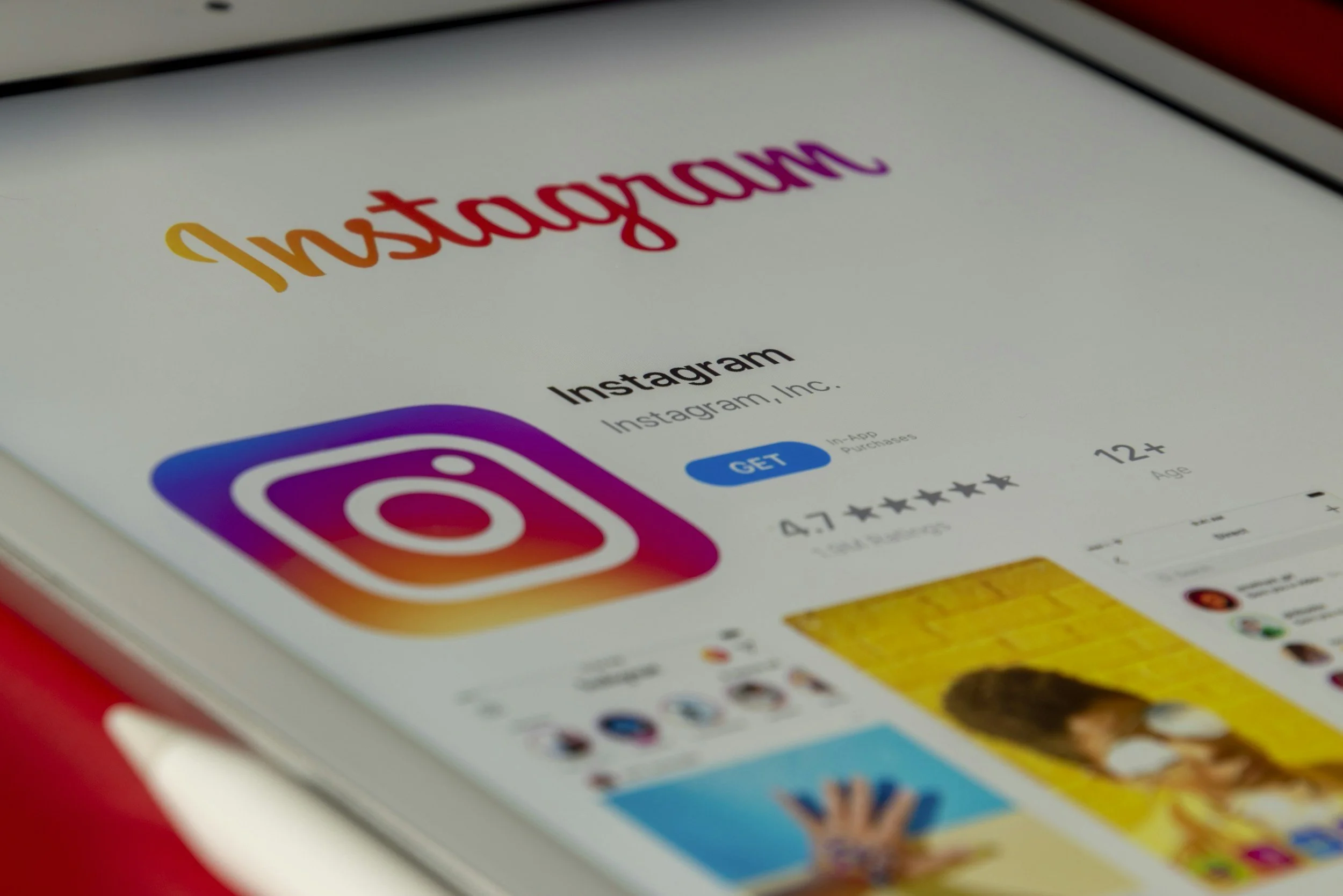 Screenshot of the Instagram app page on a mobile device, showing the app's logo, name, rating, and age restriction.