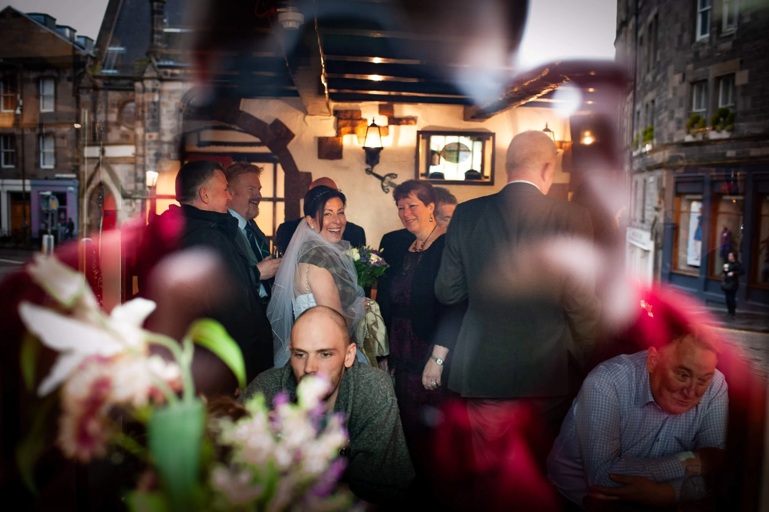 Wedding reception at Edinburgh pub on the Royal Mile — candid documentary wedding photography Scotland