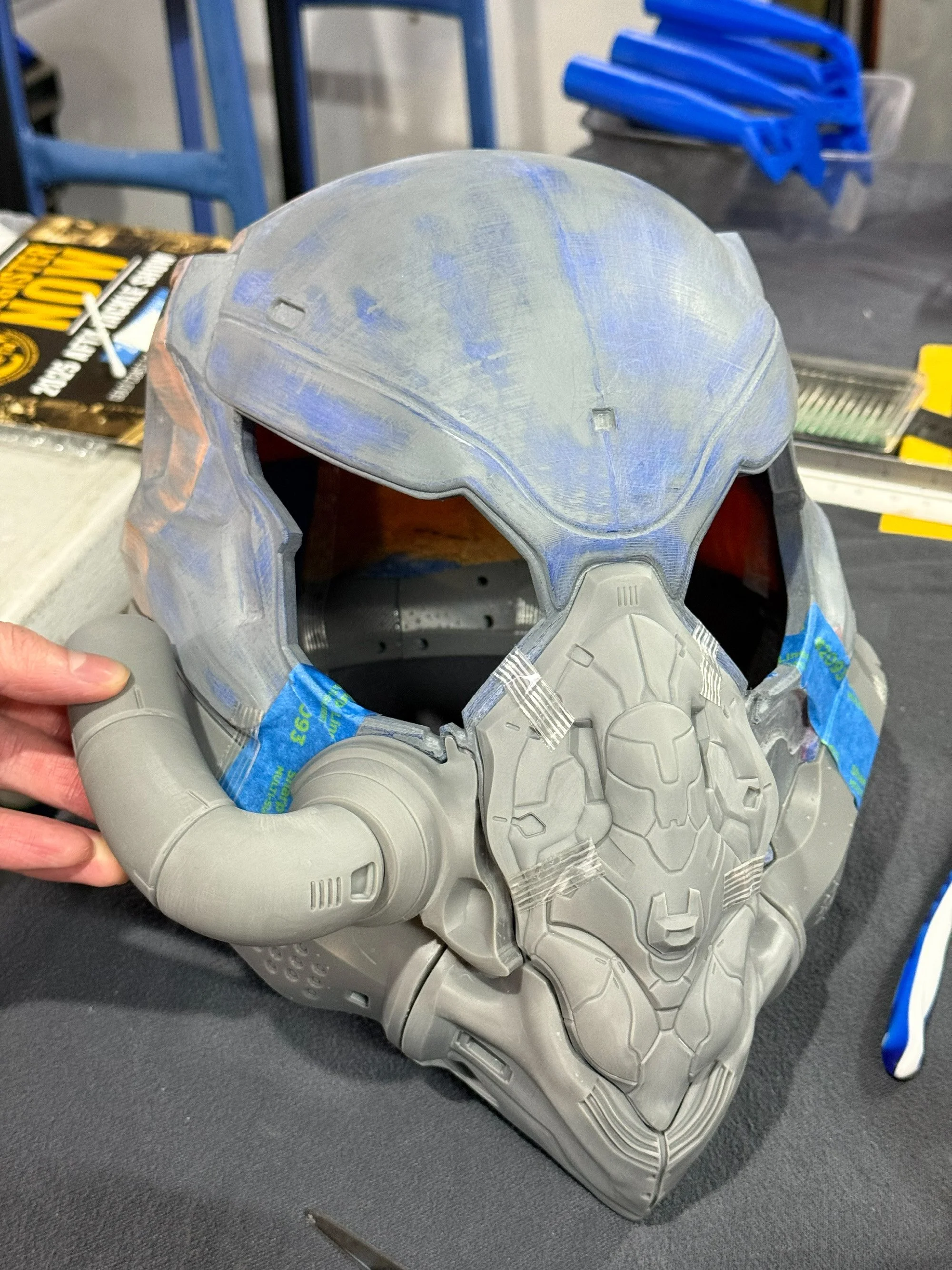 The combination of an FDM printed core with resin printed details allowed for strength of the main helmet's undetailed areas, but retention of details on the important parts. The files had to be specially designed to allow for this.