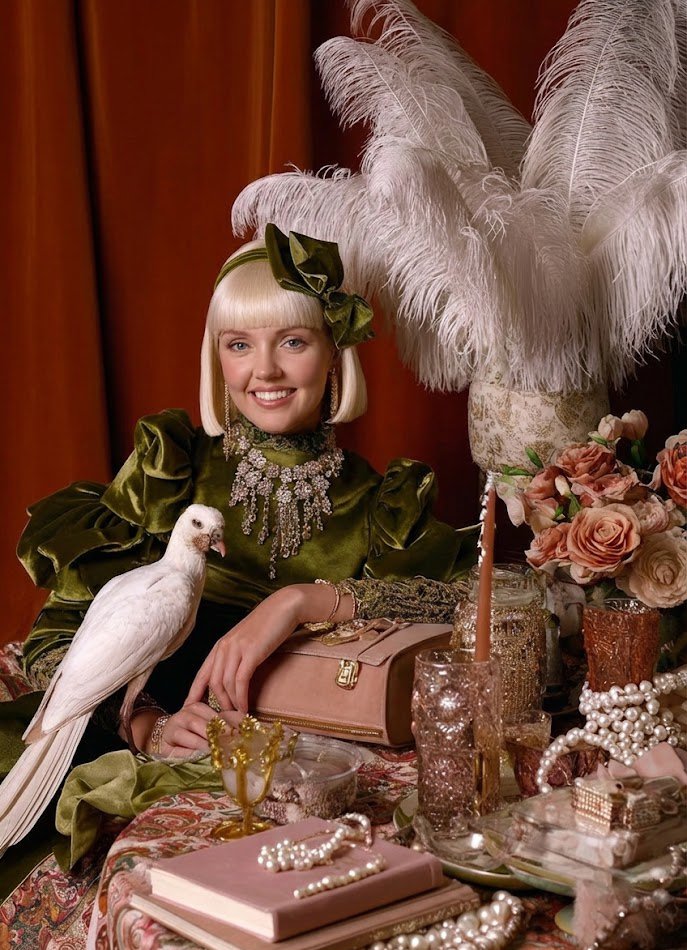 ANASTASIA - COMMITTING TO THE BIT: A bubbly, brainy, beautifully opinionated Brooklyn blonde with a devotion to dogs, the trombone, and costuming with purpose. Anastasia commits fully, whether to an idea, a character, or a point of view, never afraid