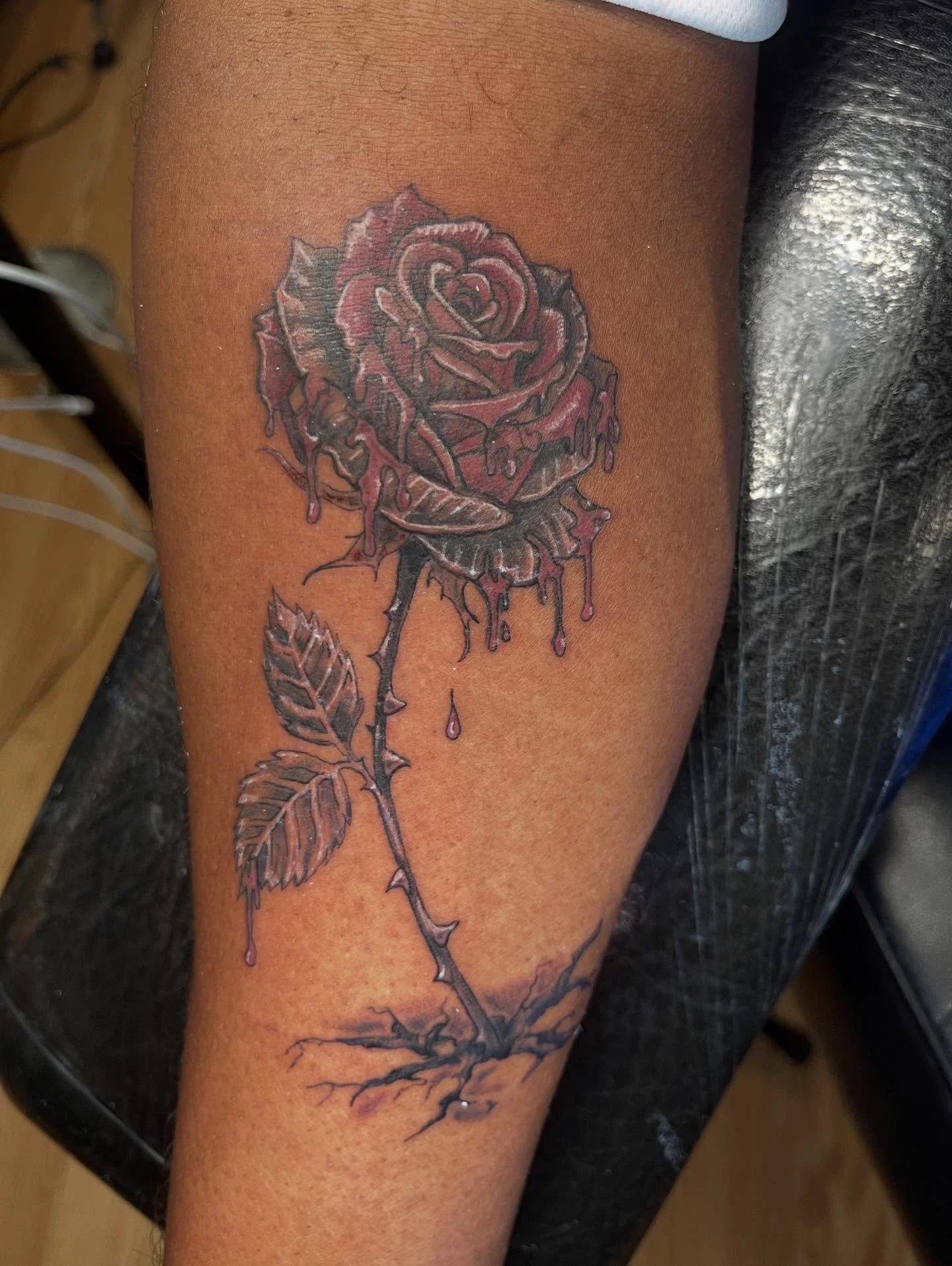 Tattoo by @Tat2Siege 🔥
🌹 Dripping beauty from the concrete &mdash; black &amp; grey realism with blood-red detail.
Every thorn earned, every petal deliberate.
📍@pennsnneedles | Bethlehem, PA

#Tat2Siege #TattooArtist #LehighValleyTattoo #PAInk #Re