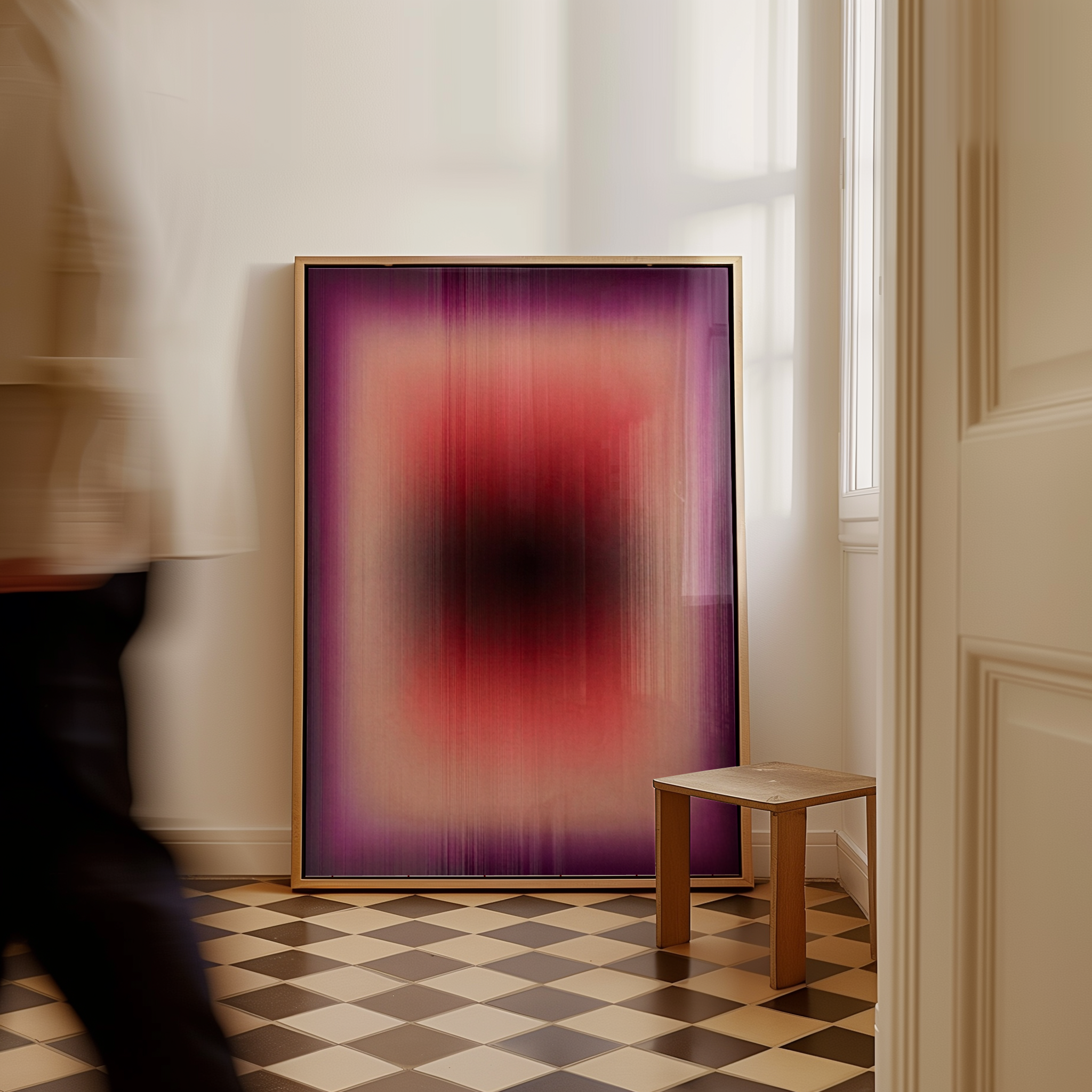 An electronic display screen with a colorful, gradient background in purple, red, and orange hues, framed in light wood, is placed in a room with checkered black and white floor tiles, beige walls, a window with sheer curtains, and a small wooden tab