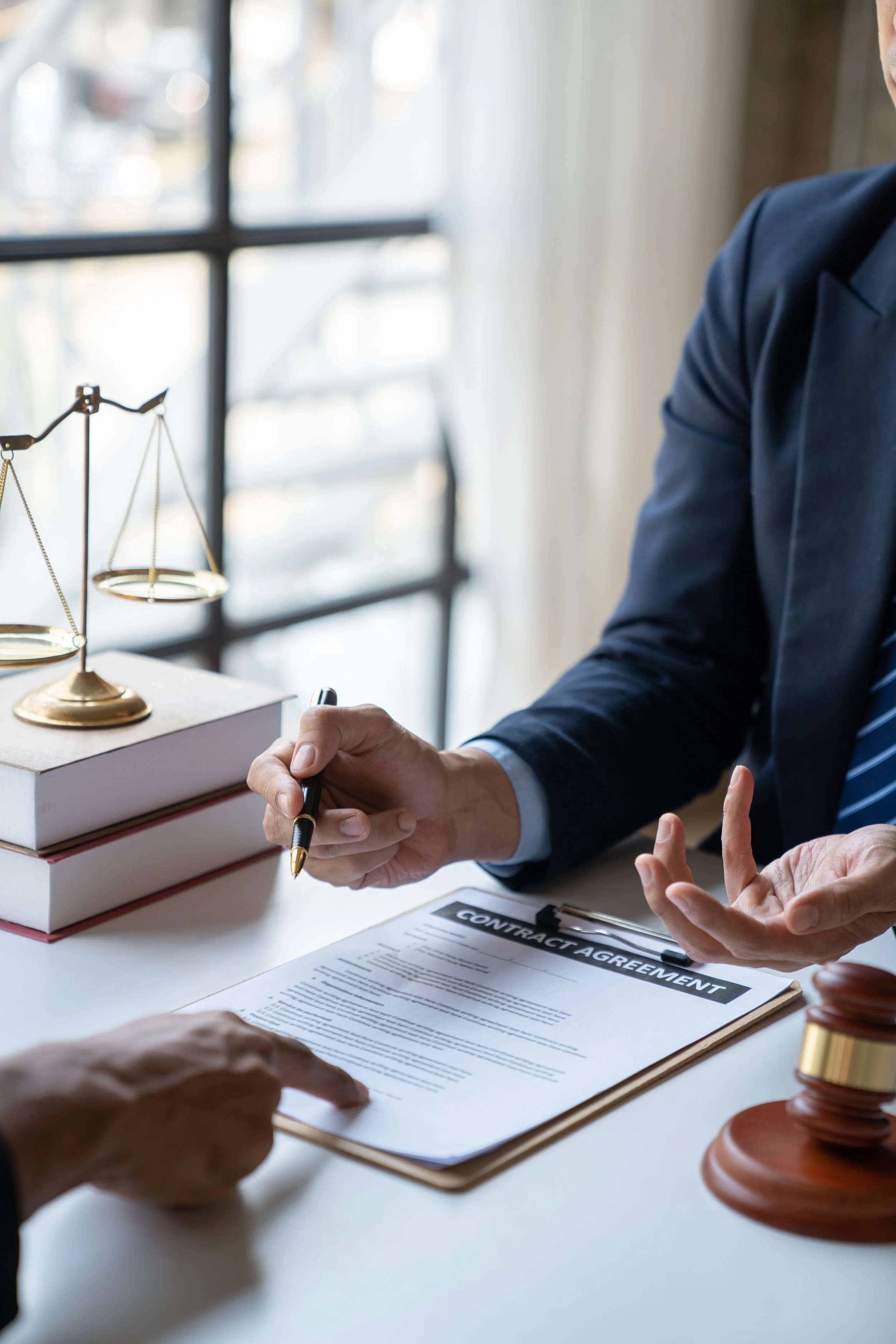 Divorce lawyer consultation in Steeleville MO discussing legal documents with client
