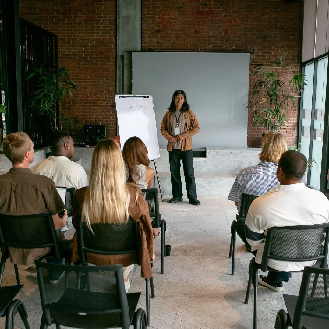 A person pausing during a presentation
