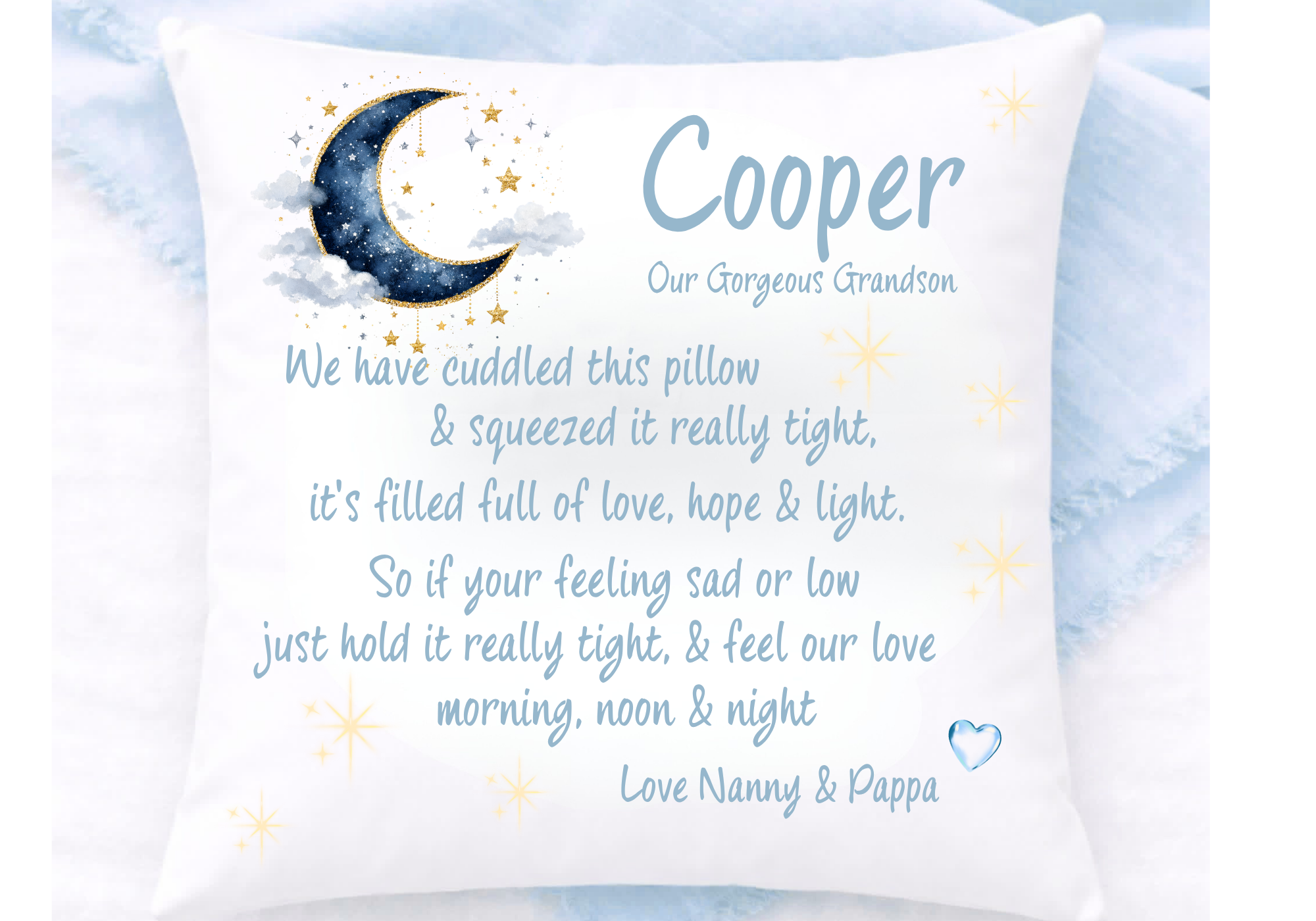 A white pillow with a design featuring a crescent moon, stars, and clouds, accompanied by a heartfelt message for a grandson from Nanny and Pappa.