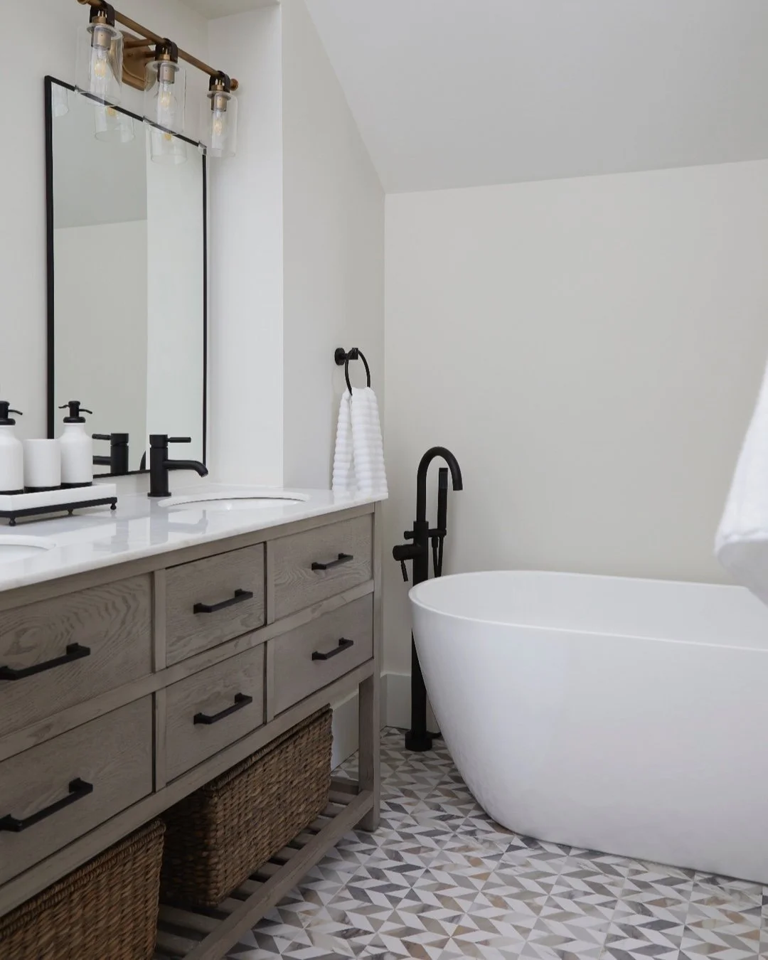 Our clients described their bathroom as &ldquo;a hallway with a sink.&rdquo;

It was where their day started&hellip; and where the stress started too. Nowhere to put anything, cold light, and no moment of quiet before the world rushed in. We asked th