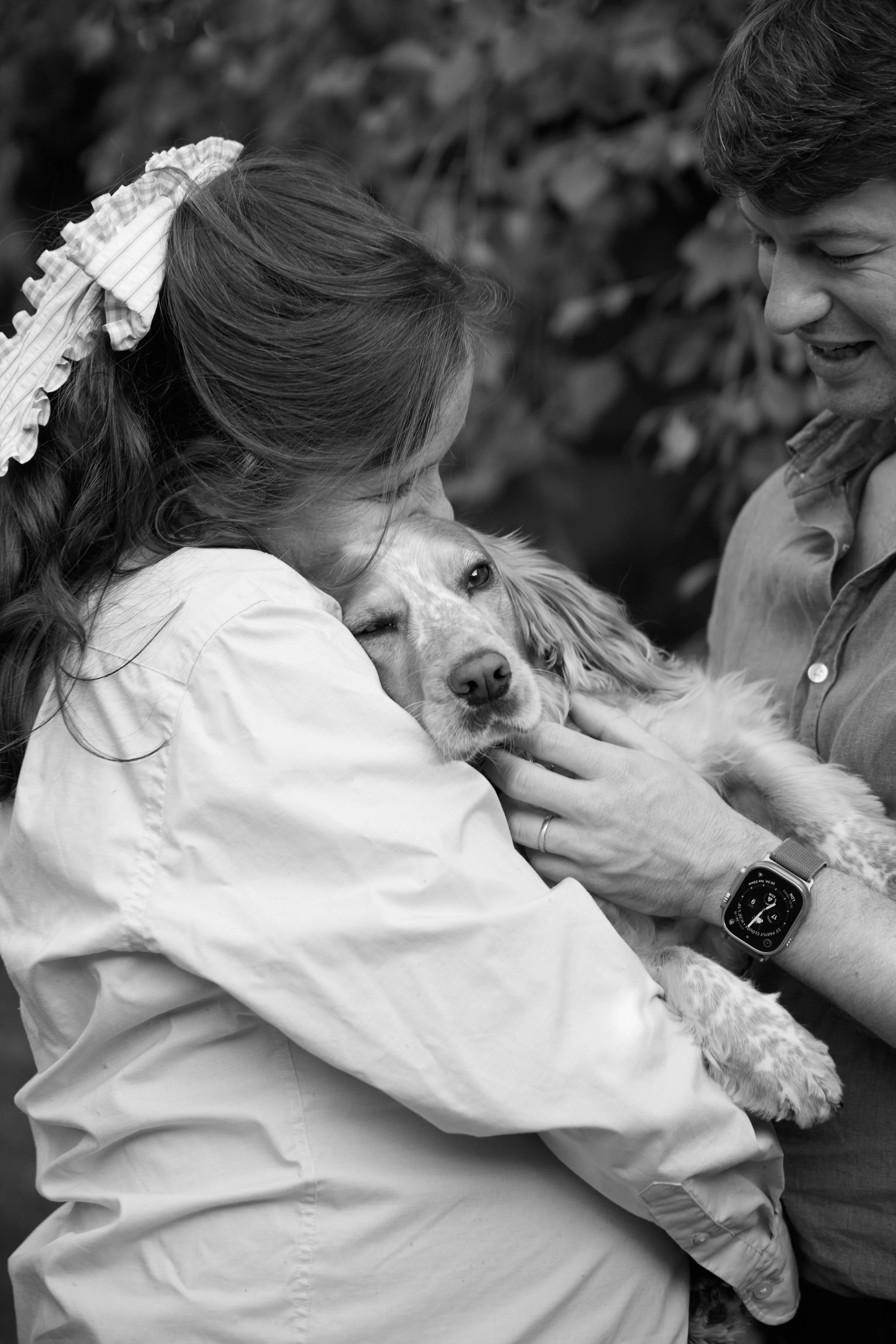 Maternity photoshoot outside home garden with animal dog relaxed unposed natural