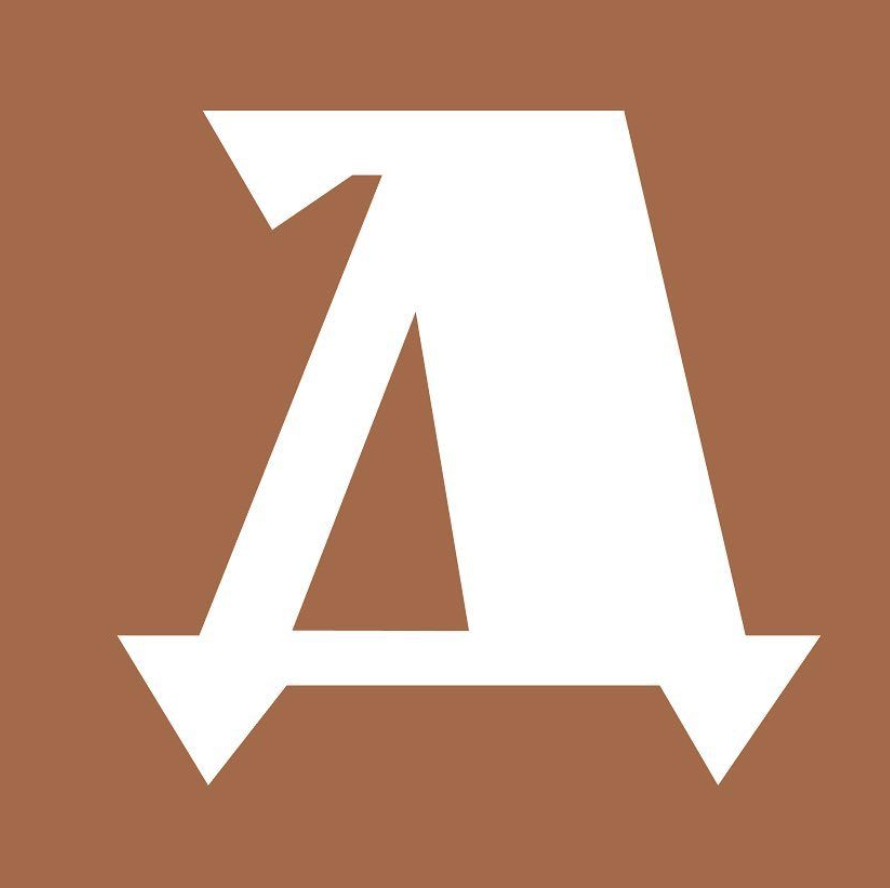 Large white letter 'A' on a brown background.