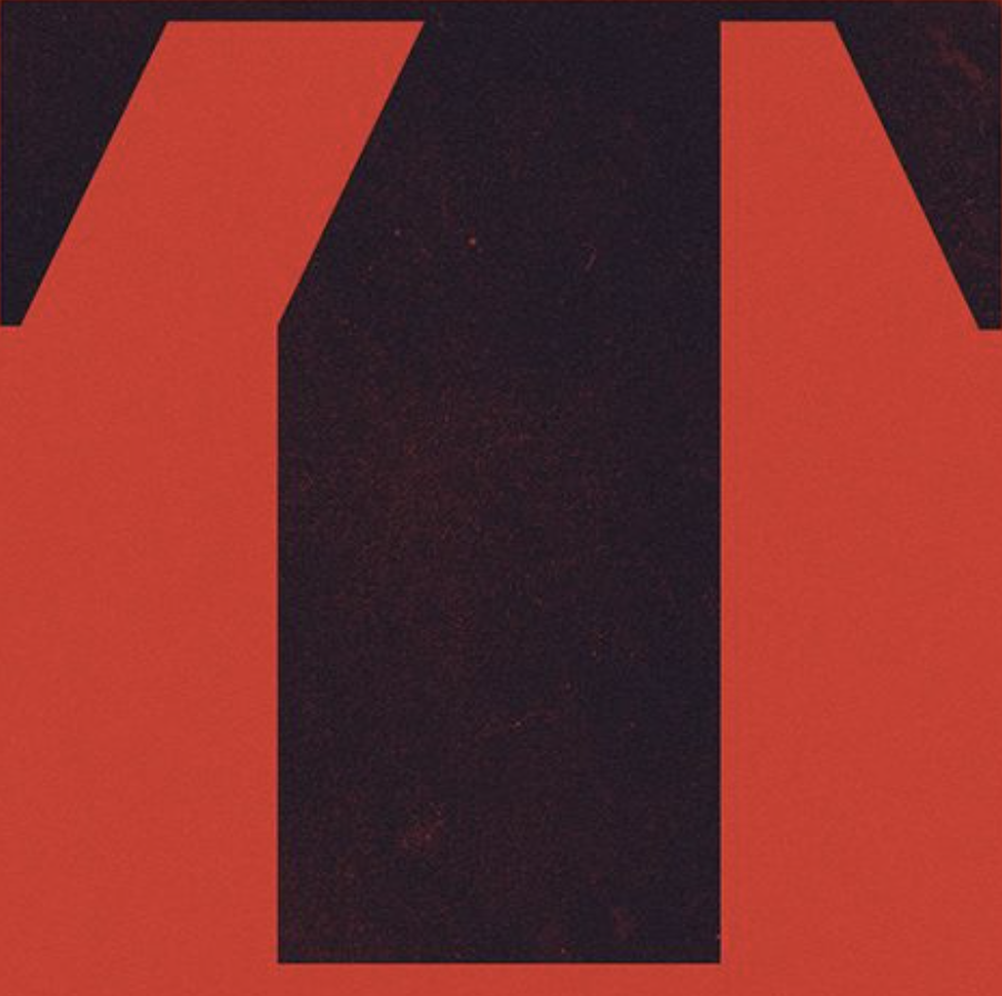 Close-up of red and black abstract graphic design.