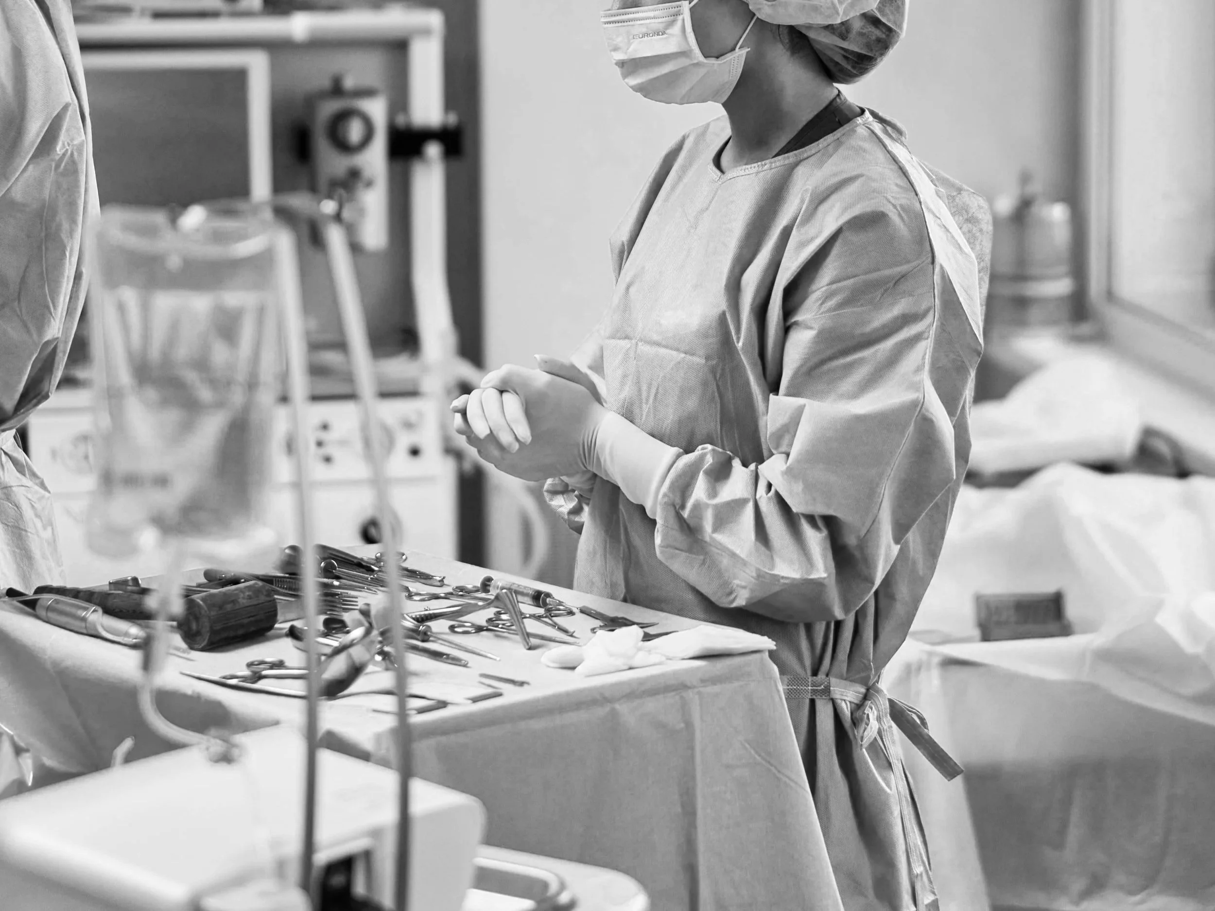 Ear nose and throat surgeon in theatre before surgery with theatre instruments