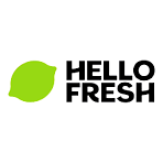 A black background with a small bright green leaf in the top left corner