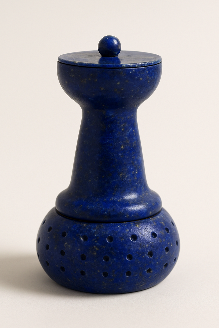 A blue Opal gemstone Alchemy Pot Soil Maker ceramic object resembling a chess pawn with a perforated spherical base and a round ball on top, set against a plain light background.