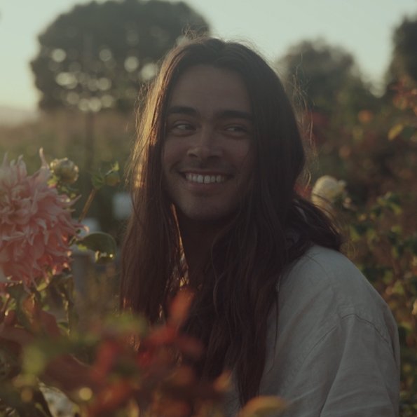 Derek Richard Thomas in Garden with Flowers and soil and compost
