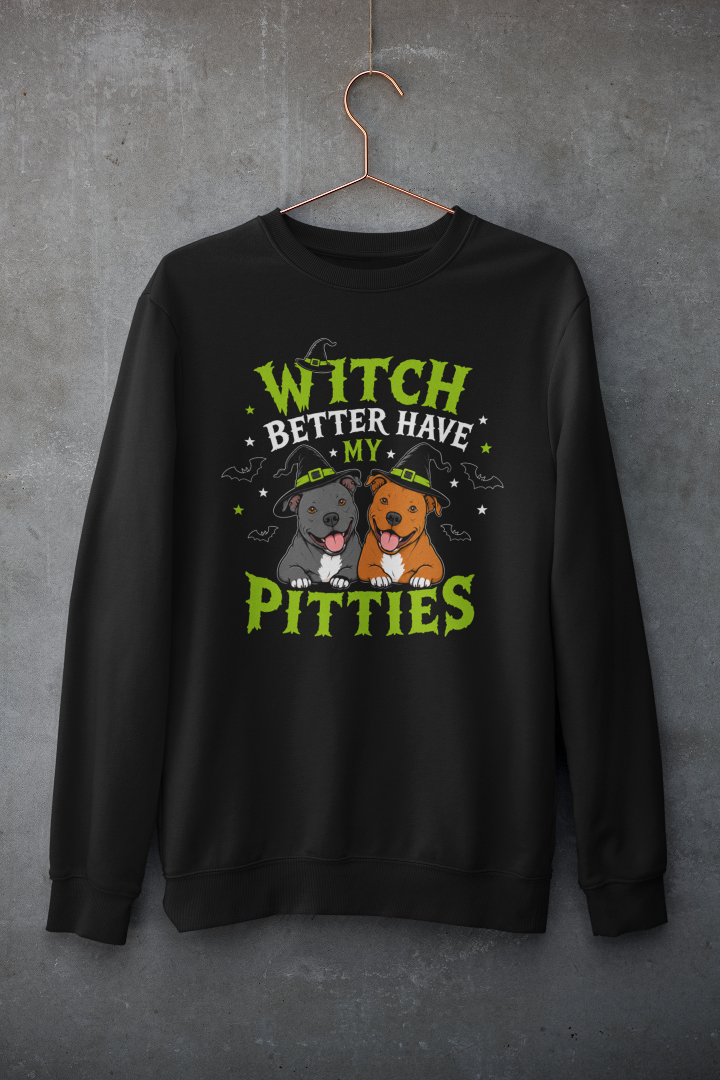 Black Halloween crewneck featuring two smiling pit bulls wearing witch hats with green and black typography reading “Witch Better Have My Pitties,” surrounded by bats and stars.