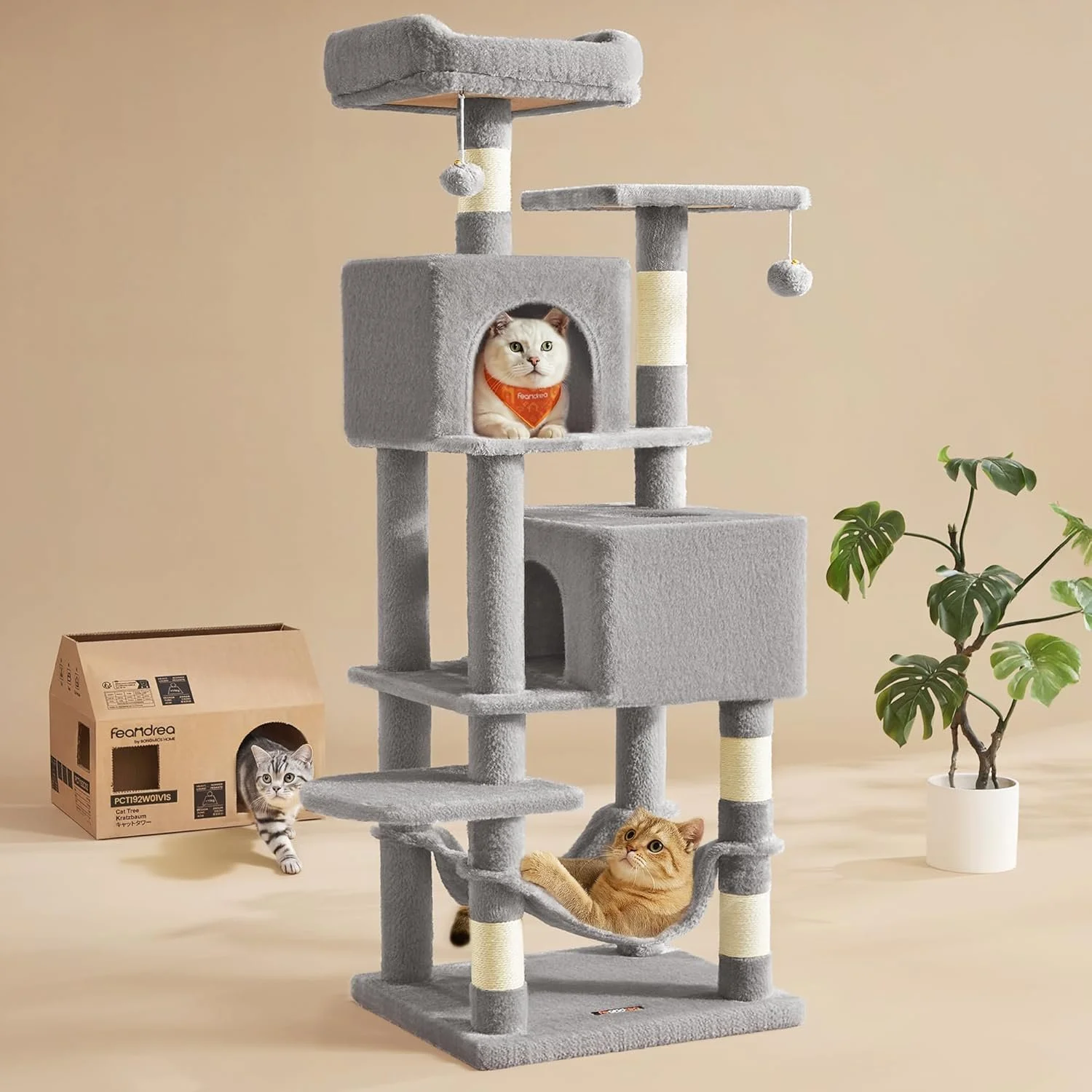 Gray multi-level cat tree with three cats, one inside a cubed hideout, one on a perch, and one in a hammock, against a beige background with a potted plant.