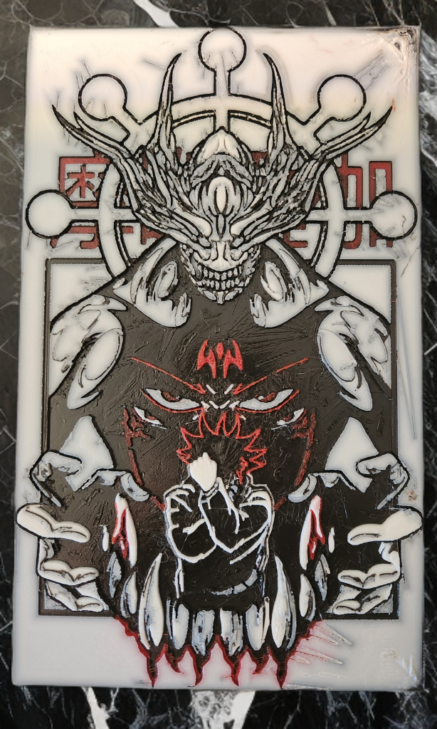 A graphic design featuring a monstrous creature with a horned, deer-like skull and a dark, angry face, with a small figure in front of it, set against a background with Japanese characters.