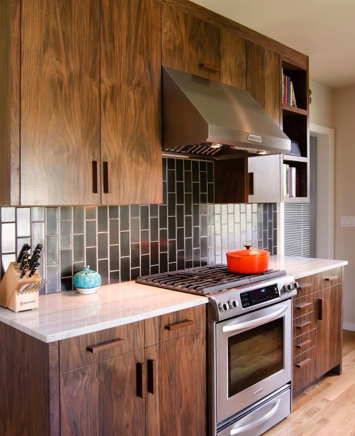 Kitchen with flat front dark wooden cabinets